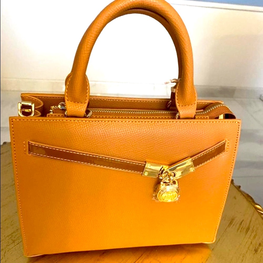 -New 4 pockets  leather gold  Handbag .